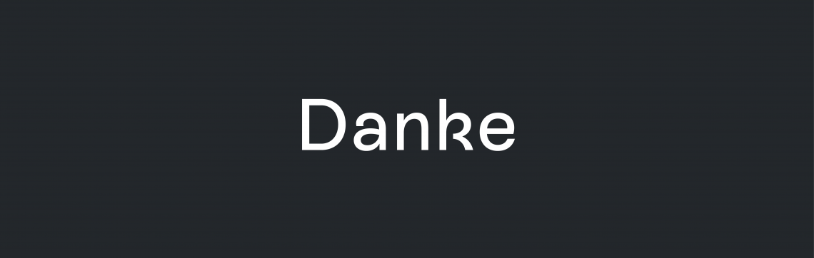 Typografische Darstellung von &quot;Danke&quot;. großgeschrieben, weiss auf dunkelgrau.